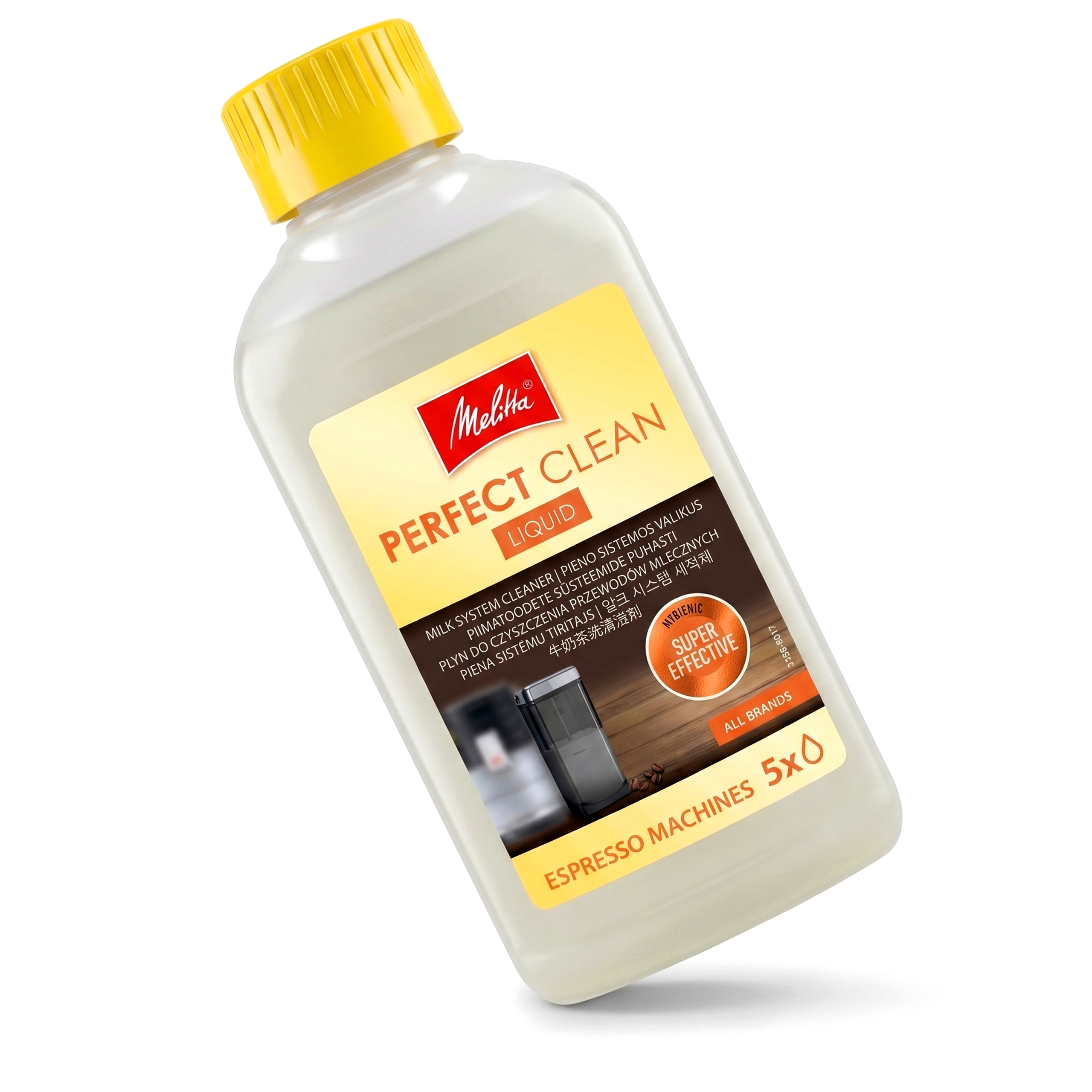Przeźroczysta butelka z żółtą nakrętką i etykietą Melitta. Na froncie grafika spienionego mleka.